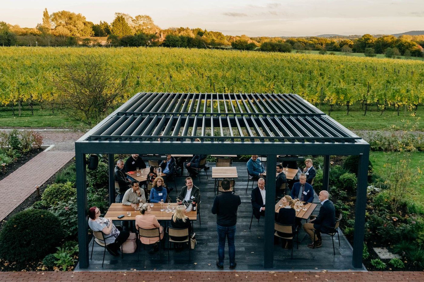The Rows & Vine terrace at Ridgeview overlooking the Chardonnay vineyard and the South Downs